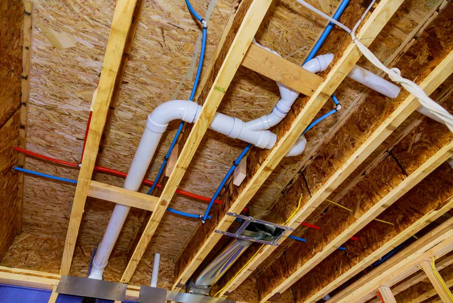 Ceiling with water pipes, drain pipes, and air ducts.