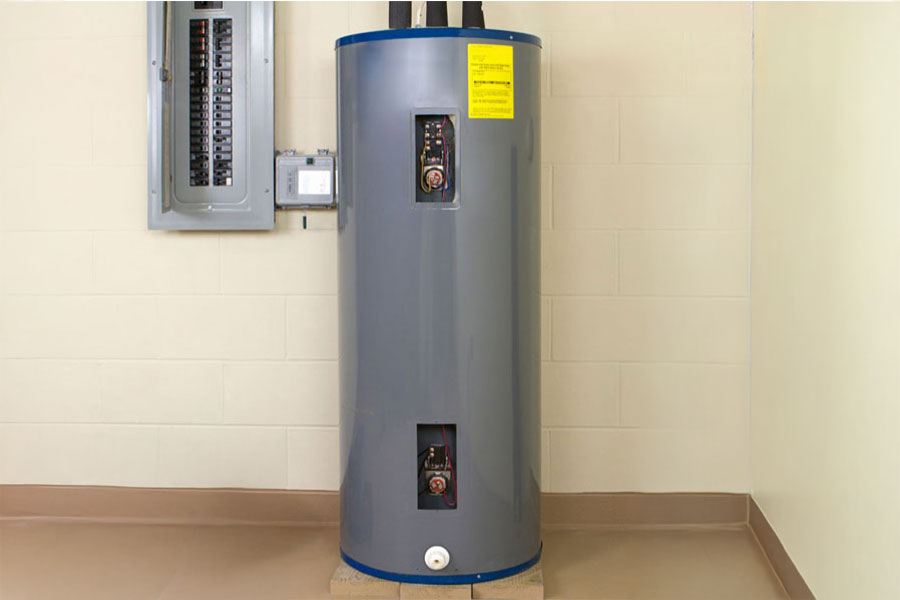 Electric water heater installed in a utility room