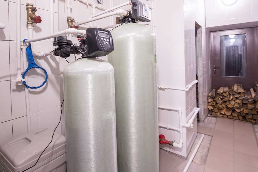 Water filtration system with two large softener tanks