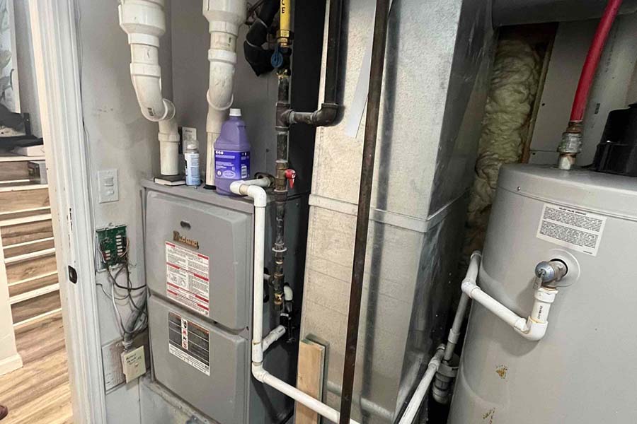 Residential furnace system with connected ductwork and water heater