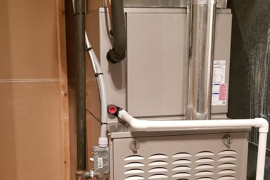 Residential furnace with ductwork and PVC piping
